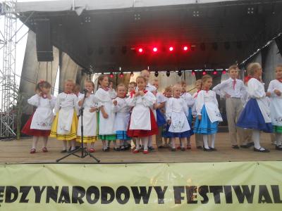 Powiększ